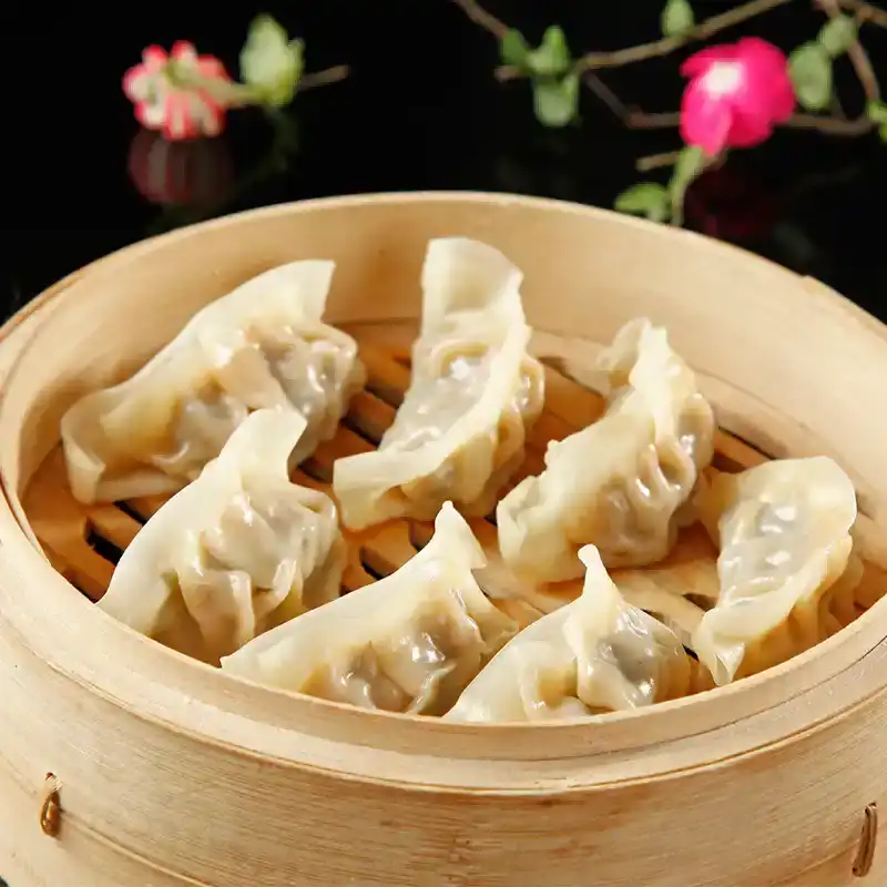 steamed pork and scallion dumplings